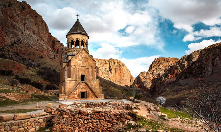 Noravank monastery nestled in a red rock canyon